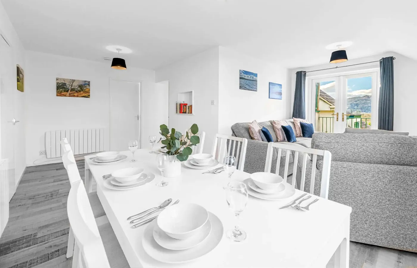 Dining table and lounge in self catering apartment in Bowness-on-Windermere