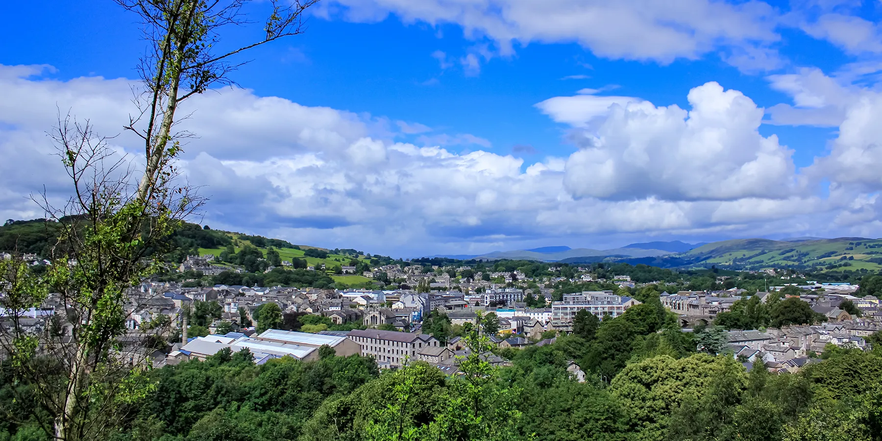 View of Kendal town and towards the Lake District on a sunny day